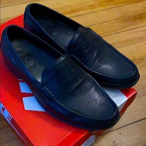 Black Cole Haan loafer.